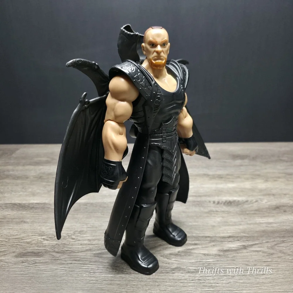 2014 Mattel WWE The Undertaker with Pop Up Black Wings 12